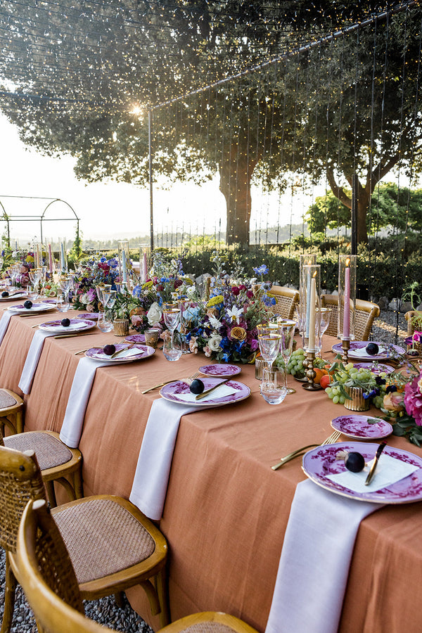 A monogrammed-forward napkin fold for wedding reception